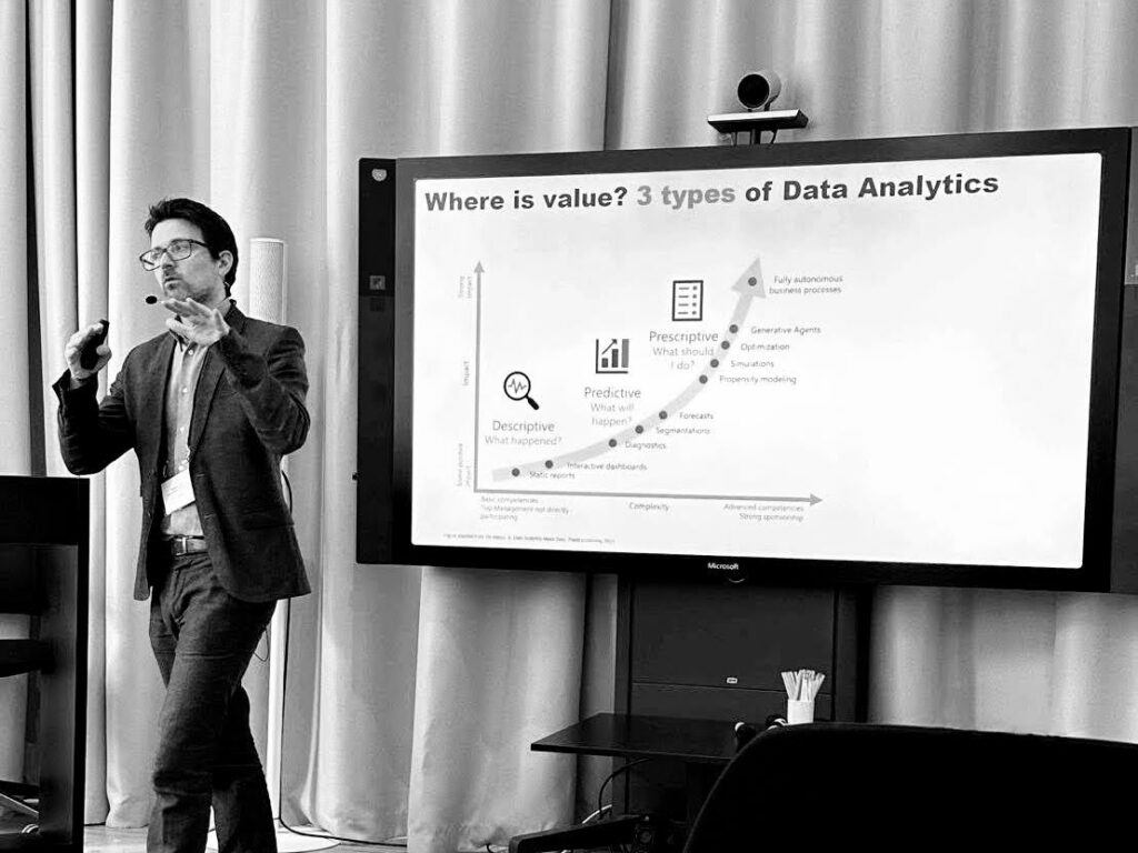 Andrea Presenting a slide on Data Analytics value